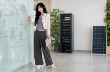Aver in an eco-conscious healthcare data office with green server infrastructure and abstract data storage diagrams
